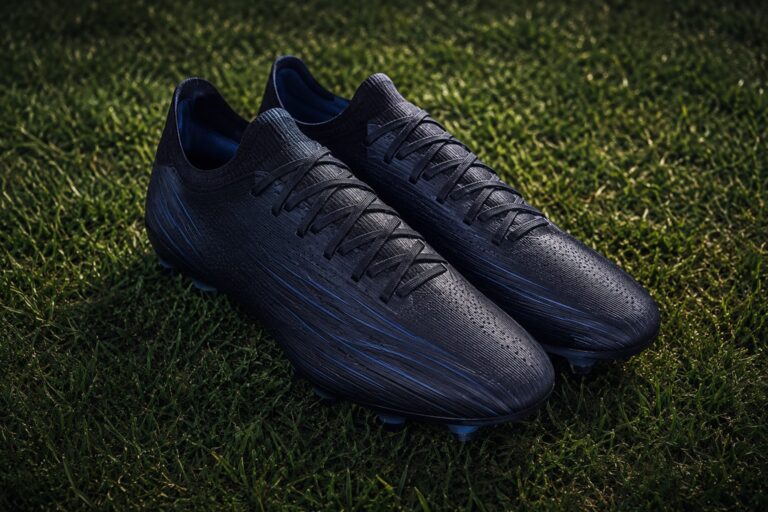 Slim football boots suitable for narrow feet on grass